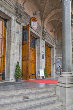 Amsterdam, Netherlands - May 18, 2018: Entrance to Roman Catholic Church Basilica Saint Nicholas at Prins Hendrikkade Street in City Centre. clipart