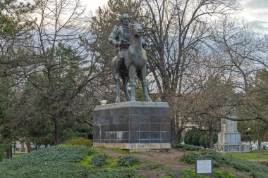 Negotin, Serbia - March 14, 2024: Equestrian Monument Hajduk Veljko Petrovic at Town Park Spring Afternoon. clipart