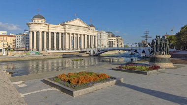 Skopje, North Macedonia - October 23, 2023: Archaeological Museum Building Historic Landmark at Vardar River Capital City Centre Sunny Autumn Afternoon. clipart