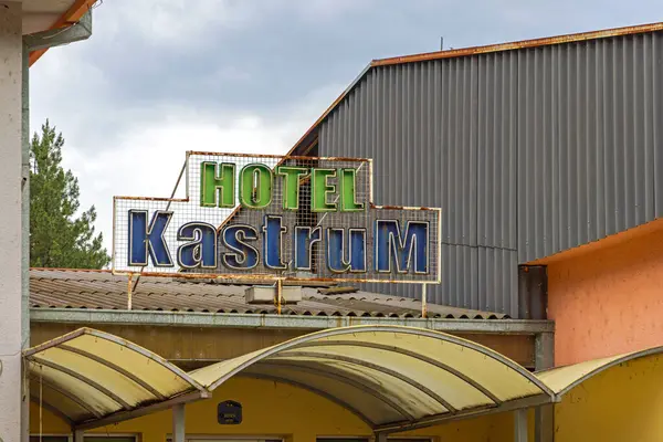 stock image Gamzigrad, Serbia - June 11, 2022: Old Style Rusty Neon Sign Hotel Kastrum Gamzigrad Spa East Serbia.