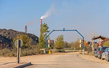 Smederevo, Serbia - October 31, 2021: Entrance Gate to Steel Mill Factory Chimney Air Pollution Environment Global Warming Hbis Group. clipart