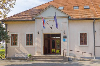 Slavonski Brod, Croatia - October 23, 2024: Entrance to Music School Education Building at Vukovarska Street Autumn Day. clipart