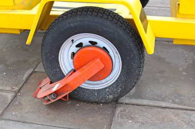 Locked Wheel Clamp Boot Prevent Trailer From Being Moved Security clipart