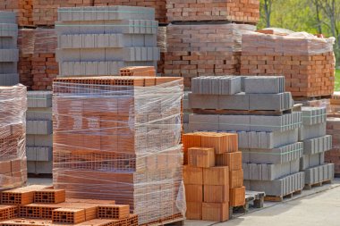 Bricks Blocks Sacks at Pallets Construction Material Storage Warehouse clipart