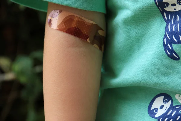 Toddler Arm Bandage Blood Testing — стоковое фото