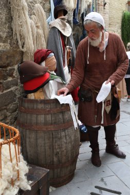 Bevagna, Italy - June 29, 2024: The Umbrian fair, Mercato Delle Gaite, that takes place yearly in the typical village of Bevagna.  clipart