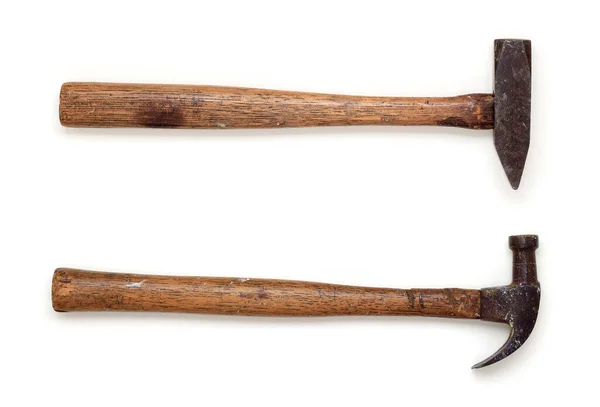 两个旧的 生锈的 磨损的带木柄的小铁锤 与白皙的阴影隔离 图库图片