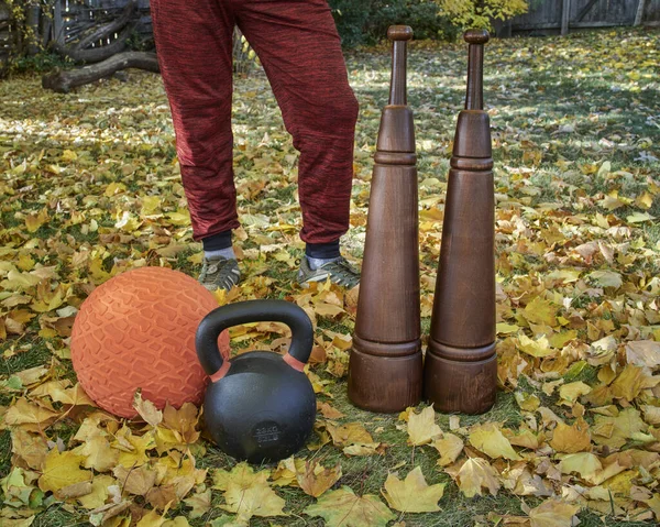 Heavy Iron Kettlebell Slam Ball Wooden Persian Clubs Backyard Fall — Stock Photo, Image