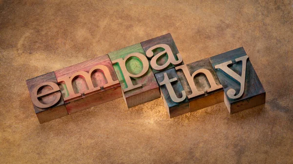 Empathy Word Abstract Letterpress Wood Type Backlit Leather Background — Stock Photo, Image