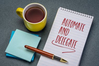 automate and delegate productivity advice - motivational handwriting in a sketchbook with a cup of coffee, business and personal development concept clipart
