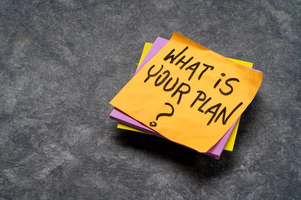 What is your plan? Handwriting on a sticky note. Business communication concept.