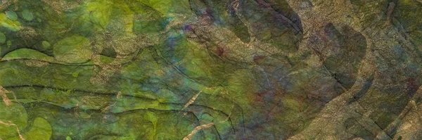 background and texture of colorful Nepalese lokta paper made from the bark of the Lokta bush, panoramic web banner