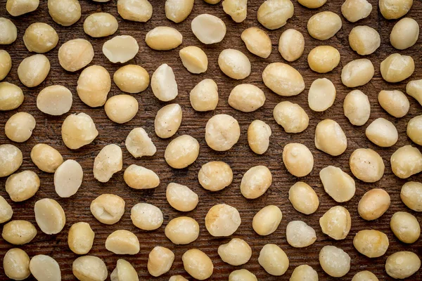 Textura Fondo Nueces Macadamia Sin Cáscara Madera Envejecida Rústica Vista —  Fotos de Stock