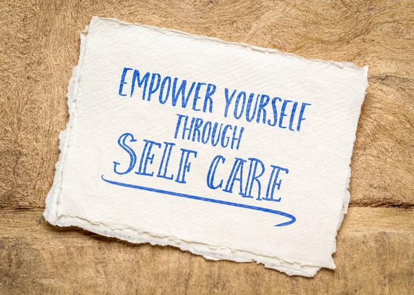 stock image empower yourself through self care- inspirational advice on an art paper, healthy lifestyle and personal development concept