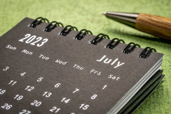July 2023 Closeup Small Desktop Calendar Pen Time Business Concept — Stock fotografie