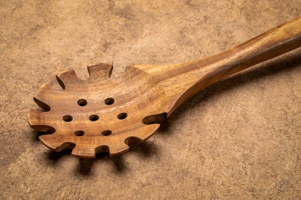 Drainer Spoon Wooden Kitchen Cooking Utensils Textured Bark Paper — Stock Photo, Image
