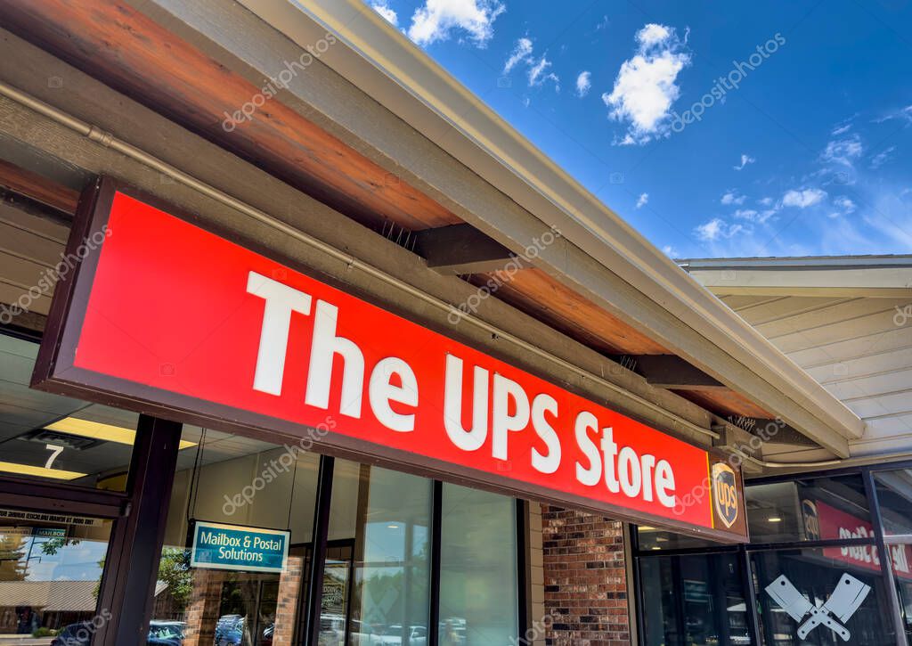 Fort Collins, CO, USA - July 10,2023: Entrance sign for The UPS Store, a subsidiary of United Parcel Service which provides, shipping, shredding, printing, fax, passport photos, personal and business mailboxes.
