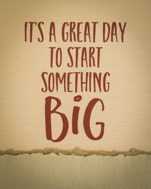 It is a great day to start something big - motivational writing on art paper clipart