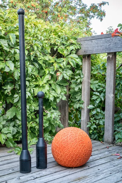 Adjustable Weight Steel Club Mace Slam Ball Wooden Backyard Deck — Stock Photo, Image