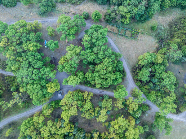 Whitetail Campground on the shore of Dismal River in Nebraska National Forest, late summer dawn aerial view