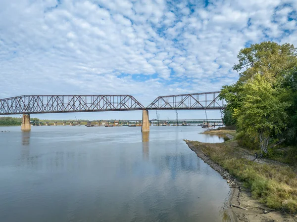 stock image Chain of Rocks on the Mississippi River above St Louis the old historic bridge and the new bridge with construction work