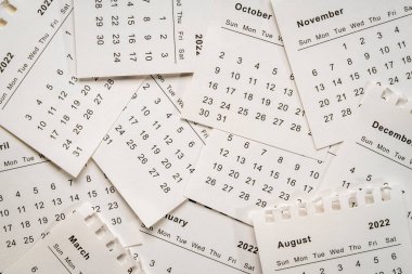 Aylık takvim sayfalarının arkaplanı, iş ve zaman geçirme kavramı