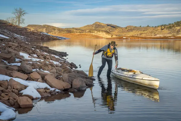 Senior Male Wearing Life Jacket Paddling Expedition Canoe Winter Scenery — Stock fotografie