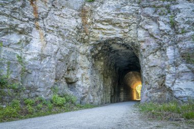 MKT tunnel on Katy Trail at Rocheport, Missouri. The Katy Trail is 237 mile bike trail stretching across most of the state of Missouri converted from an old railroad. clipart