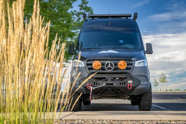 stock image Loveland, CO, USA - August 24, 2024: Storyteller Overland Beast Mode, 4x4 camper van on Mercedes Sprinter chassis.