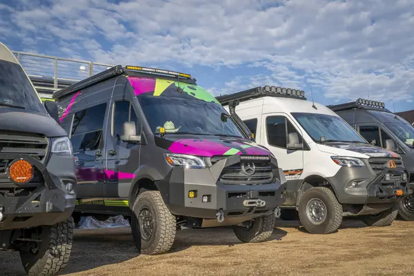 stock image Loveland, CO, USA - August 23, 2024: Storyteller Overland Beast Mode, 4x4 camper vans on Mercedes Sprinter chassis.