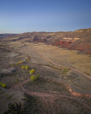 dusk over a valley in foothills of Rocky Mountains in Colorado in fall scenery