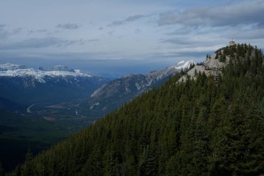 Photo of the Sundance Range in the Canadian Rockies within Banff National Park in Alberta, Canada. clipart