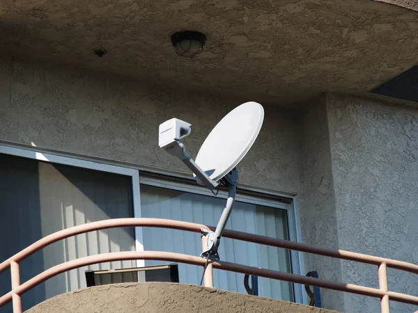 Satellite Dish Mounted Apartment Balcony Railing Wall Sliding Glass Door — Stock Photo, Image