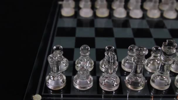 Glass Chess Pieces Start Setup Black Background Camera Moving Them — Stock Video
