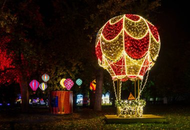 Hungary Budapest Nov. 4 2022:  Lumina Park lightshow.  Five continents representation in colorfully presented for all ages. clipart