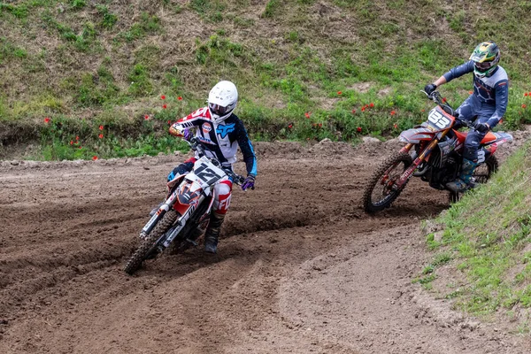 stock image Tapiobicske Hungary - June 11, 23 :  Unidentified racers in MX2  MX2 race during the open, Motocross Championship.  