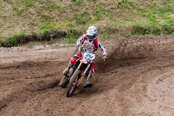 stock image Tapiobicske Hungary - June 11, 23 :  Unidentified racers in MX2  MX2 race during the open, Motocross Championship.  