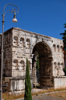 Arch of Janus, ancient Roman quadrifrons triumphal arch in city of Rome, Italy, landmark from the 4th century AD. clipart