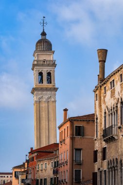 City of Venice, Italy. Leaning bell tower (1592) of San Giorgio dei Greci (Saint George of the Greeks), Greek Orthodox church from Rio Dei Greci canal in Castello neighborhood. clipart