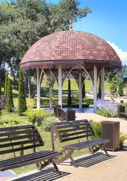 stock image Pavilion with a flowerbed in the Crimean Tatar style in a park in Kyiv. June