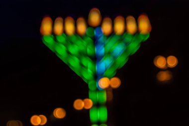 Blurred background with a menorah. Place for text clipart