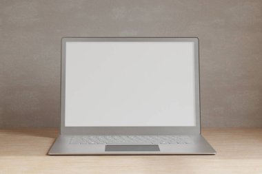 Minimal Scandinavian home working space interior design with blank laptop computer mockup and accessories on wooden table over the wall. 3d rendering