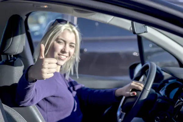 Smiling Woman Car Giving Thumbs Possibly Indicating Good Driving Experience Stockfoto