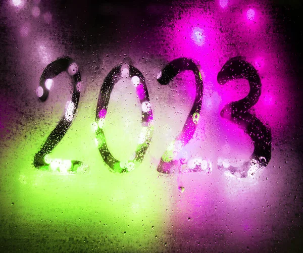 Closeup rainy freeze big view green color hand draw glare dot merry xmas party greet card de focus art soft time shape. Cold frost rain city street car drawn eve fog spark flare flash text space letter