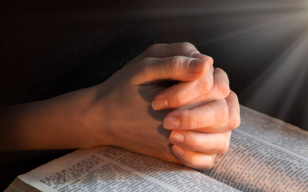 Young israel lady hold palm beg think trust bless love life light Lord Jesus Christ new word. Old retro history teen arab male man guy boy sin soul spirit thank praise peac grace dark night text space