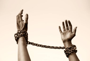 Close up jail law danger addict fear worry young sad lone guy ask god help drug aid victory life cloud text space Closeup alone lady sin limit old bind iron steel metal lock raise restrain kidnap body