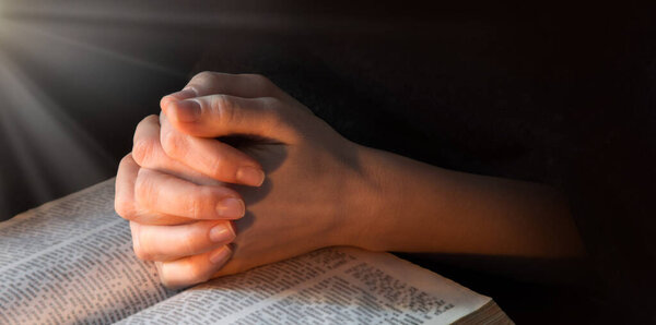 Young israel lady hold palm beg think trust bless love life light Lord Jesus Christ new word. Old retro history teen arab male man guy boy sin soul spirit thank praise peac grace dark night text space