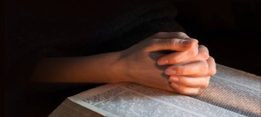 Young israel lady hold palm beg think trust bless love life light Lord Jesus Christ new word. Old retro history teen arab male man guy boy sin soul spirit thank praise peac grace dark night text space