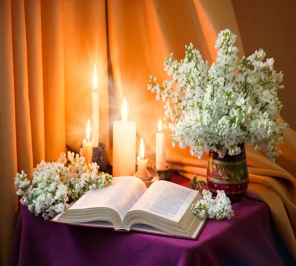 Rustic pray psalm write love table space card. Holy age jew home culture god Jesus Christ literary night even art rose lilac petal bunch still life flame fire glow symbol concept backdrop wed decor