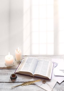 Grunge past age worn jew psalm teach pray open holy sacred Jewish torah law ink quill pen write page light wood desk table text space. Closeup top view New culture god gospel post card art still life